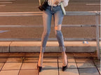 Trendy High-waisted Cropped Jeans With Raw Edges And Ripped Holes